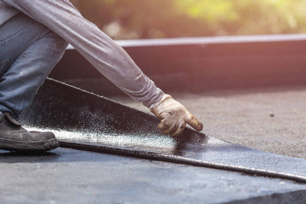 Professional Basement Waterproofing technician working in Newtown, OH